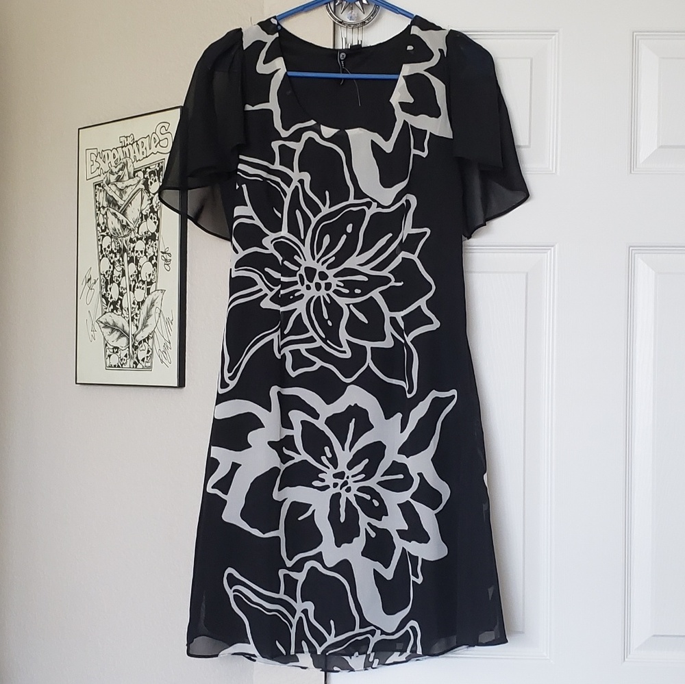 Black and White Dress with Shoulder Cape